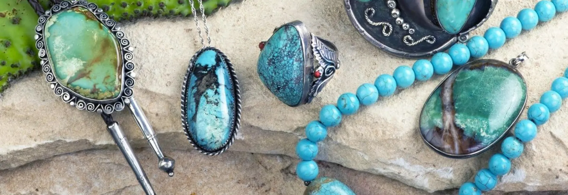 A close up of some jewelry on the ground