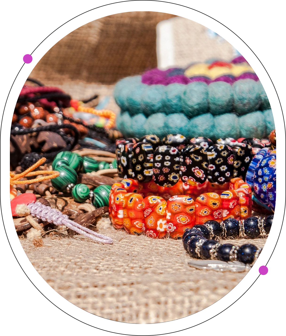 A close up of many bracelets on the ground