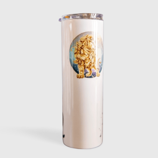 A tall white cup with some food inside of it