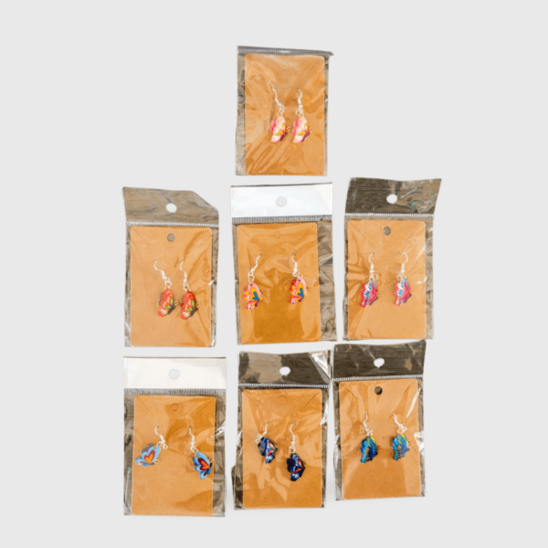 A set of seven pairs of earrings in packages.