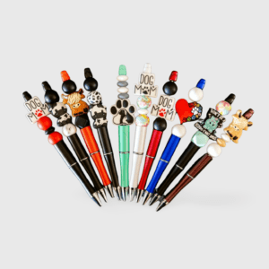 A bunch of pens that are on top of each other