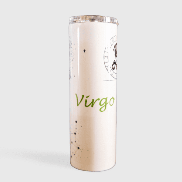 A tall white candle with the word virgo written on it.