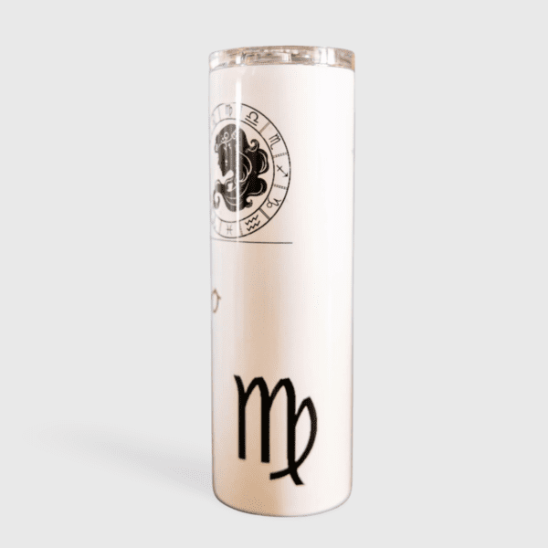 A white candle with the zodiac sign virgo on it.