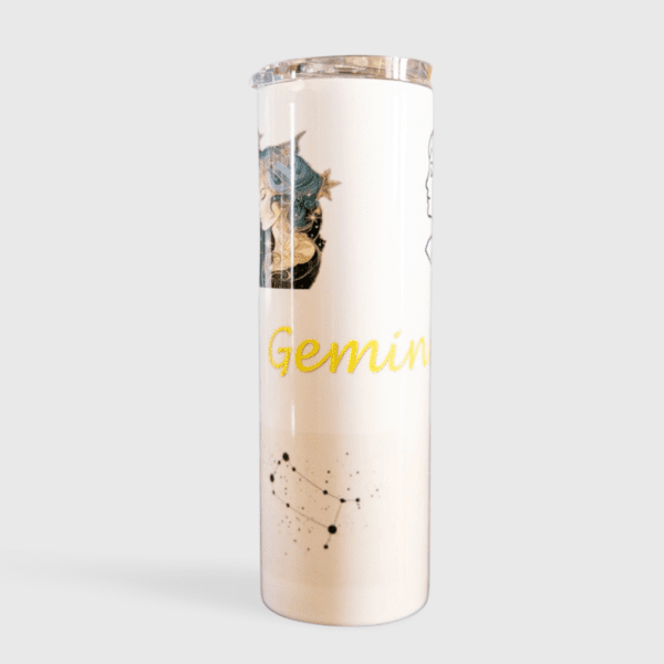 A white tumbler with a picture of a cat on it.