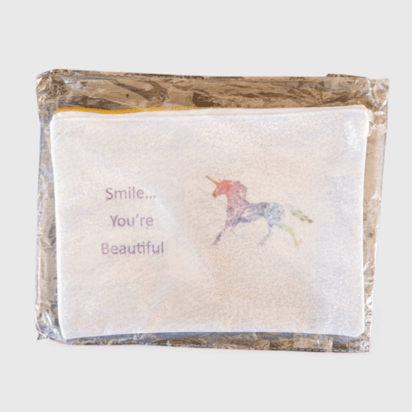 A bag of tissues with the words smile you 're beautiful on it.