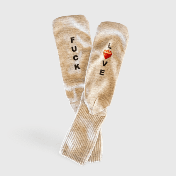 A pair of socks with the words fuck love written on them.