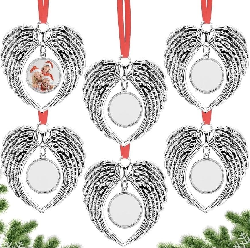 A set of six silver ornaments with wings.