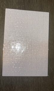 A white sheet of paper with a pattern on it.