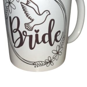 A white mug with the word bride written on it.